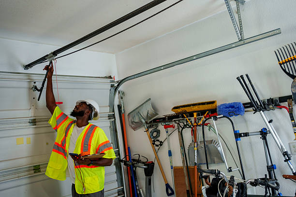 Professional Garage Door Panel Replacement technician working in Vanderburgh County County, IN